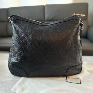 I am selling my Gucci Leather Hobo Bag with Dust bag in great condition.